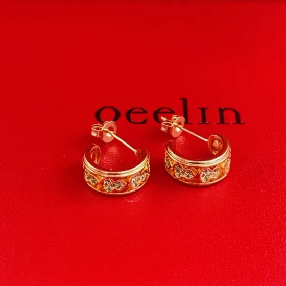 Qeelin Wulu earrings 18K rose gold with clear diamond accents 10mm hoop diameter