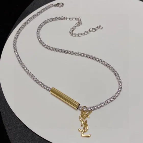 Saint Laurent Cassandre YSL Monogram Crystal Tennis Choker necklace silver-toned metal with clear faceted crystals gold-toned metal logo and bar accent 40cm with 5cm extender