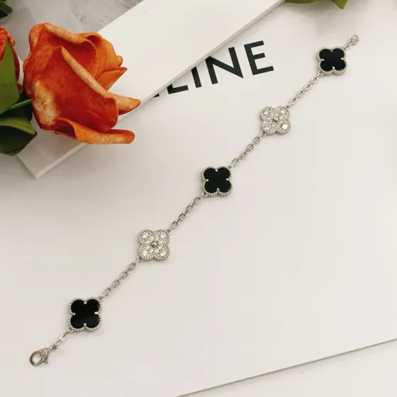 Van Cleef Arpels Alhambra bracelet Silver-toned white gold metal with black onyx and clear diamond accents 19cm