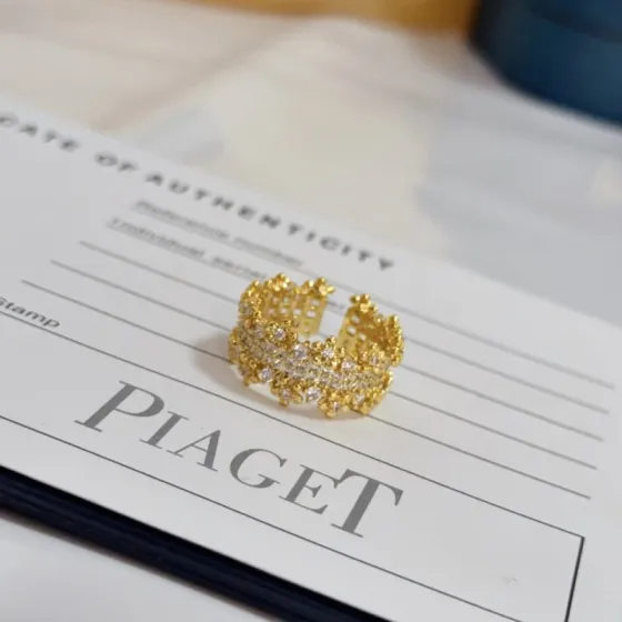 Piaget Sunlight Escape ring yellow gold with clear diamond accents adjustable open band