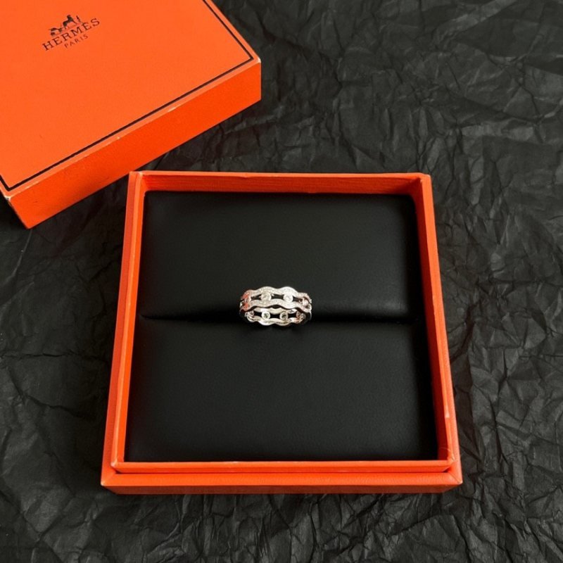 Hermes Chaine d Ancre Waves ring 18k white gold with clear diamond accents 18k rose gold with clear diamond accents EU 52