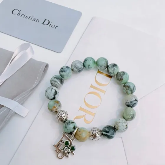 Dior Beaded Charm Bracelet bracelet Silver-tone metal with variegated green white and yellow natural stone beads accented with dark green cabochon stones 18cm