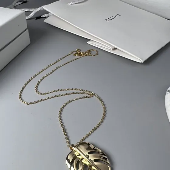 Celine Monstera Leaf Pendant necklace gold-tone metal no additional stones 45cm with 5cm extender