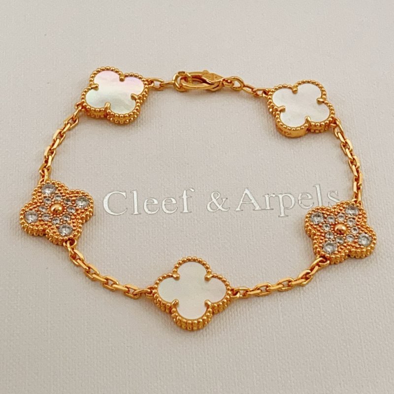 Van Cleef Arpels Alhambra bracelet Yellow gold with white mother-of-pearl and clear diamond accents 17cm
