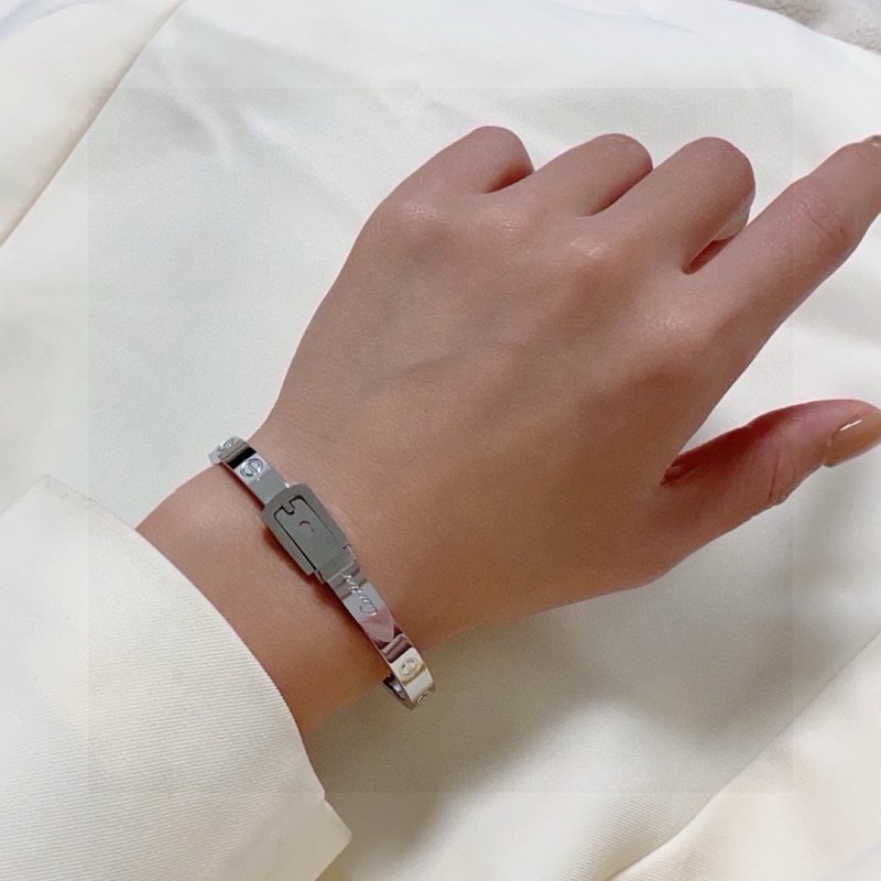 Cartier Buckle Motif Love Bangle bracelet Polished yellow gold-tone metal polished silver-tone metal no gemstones 17cm inner circumference