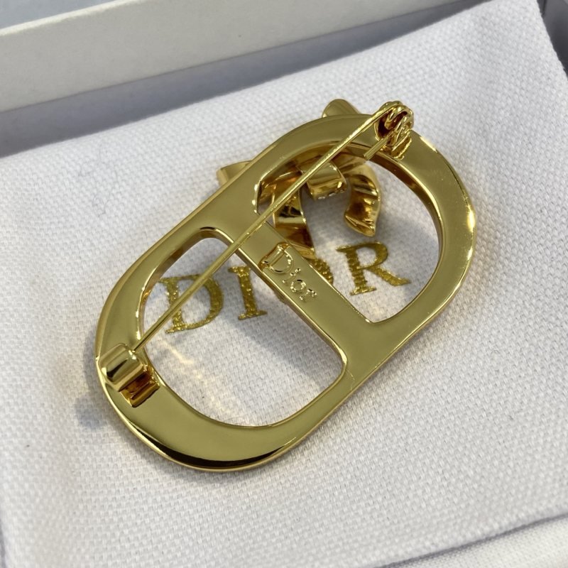 Dior CD Logo Bow Brooch brooch gold-tone metal clear crystal rhinestones white mother-of-pearl inlay 3 5cm width