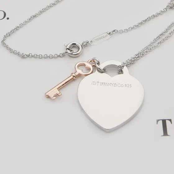 Tiffany Co Return to Tiffany Heart Tag with Key necklace Sterling silver with rose gold key accent 18 inches