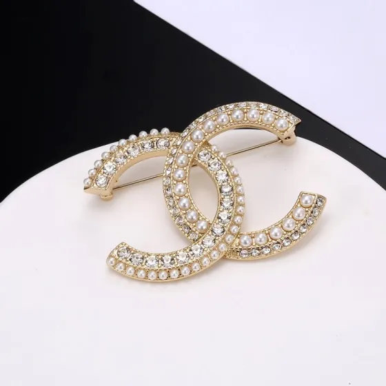 Chanel CC Logo Brooch brooch gold-tone metal white faux pearls clear crystals 3 5cm width