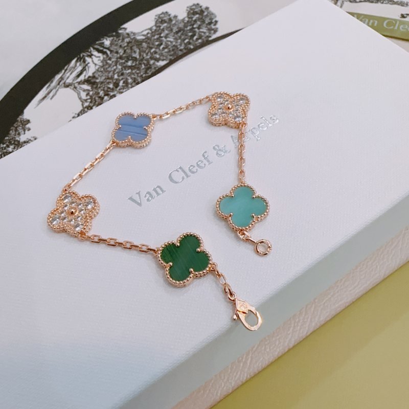 Van Cleef Arpels Alhambra bracelet Rose gold metal with blue chalcedony green malachite turquoise and clear diamond accents 18cm