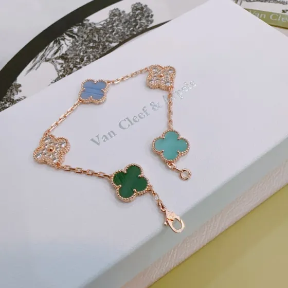 Van Cleef Arpels Alhambra bracelet Rose gold metal with blue chalcedony green malachite turquoise and clear diamond accents 18cm