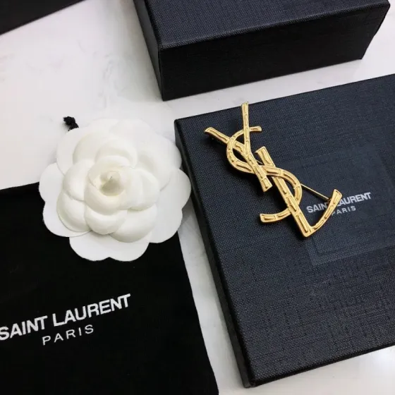 Saint Laurent Cassandre Bamboo YSL Monogram brooch gold tone metal no gemstones 4 5cm height