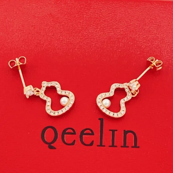 Qeelin Wulu earrings rose gold metal with clear diamonds and white freshwater pearls 1 2cm drop length