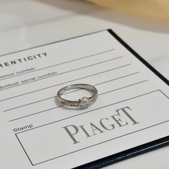 Piaget Possession ring 18K white gold with clear diamond accents US 6