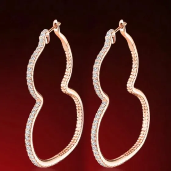 Qeelin Wulu earrings rose gold metal with clear diamond pave 3 5cm hoop diameter