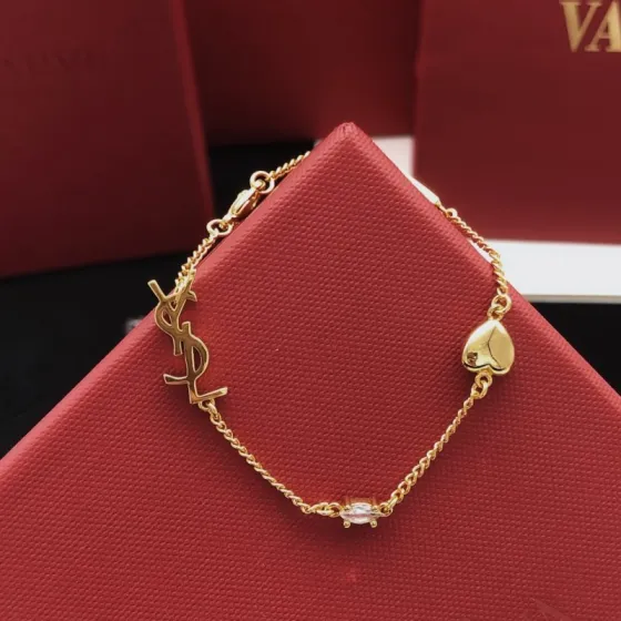 Saint Laurent YSL Monogram Heart Crystal Charm Bracelet bracelet gold-tone metal with clear faceted crystal 18cm with 2cm extender