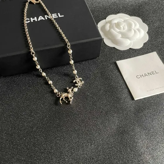 Chanel CC Logo Deer Charm Pearl Choker necklace light gold metal white faux pearl clear crystal 40cm