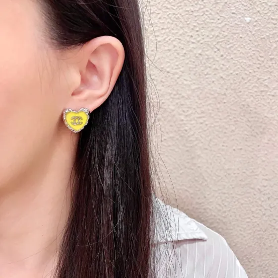 Chanel CC Heart Stud Earrings earrings silver-tone metal with bright yellow enamel 1 5cm diameter