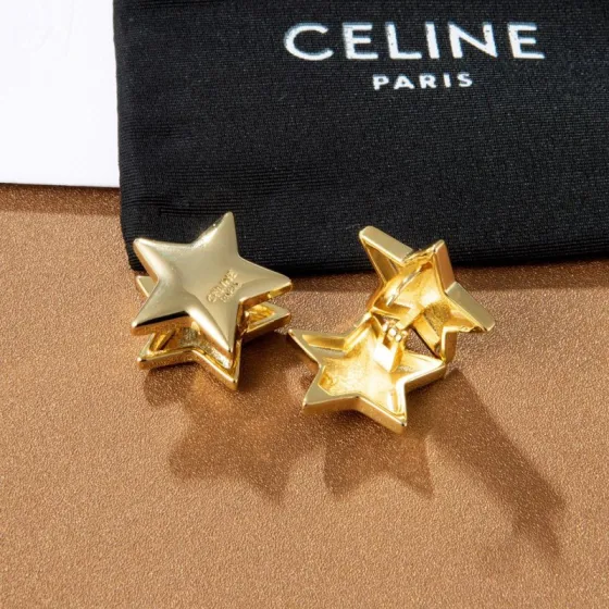 Celine PRECLOUS Star earrings gold tone metal 2cm diameter