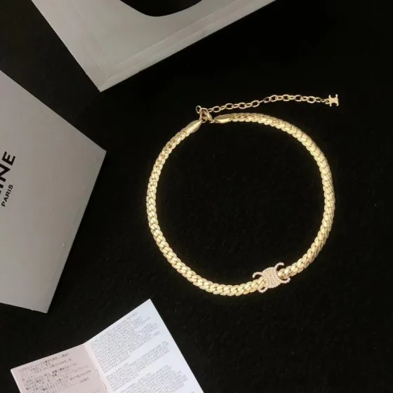 Celine Triomphe necklace gold-tone metal with clear crystal accents silver-tone metal with clear crystal accents 40cm with 5cm extender