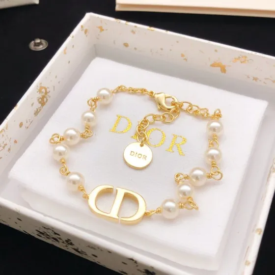 Dior 30 Montaigne Pearl CD Bracelet bracelet gold-tone metal with white resin pearls 18cm with 3cm extension chain