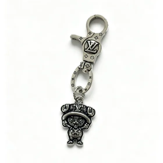 Louis Vuitton Anger Forest Chopper Charm Keychain pendant antique silver-toned metal with black oxidized detailing 8cm total length