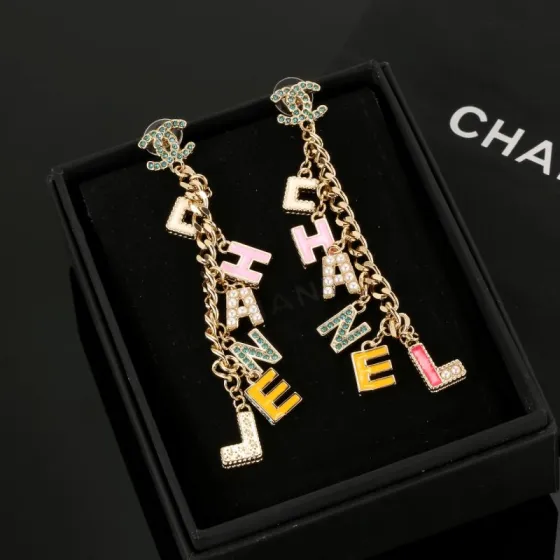 Chanel CHANEL Letter Charm CC Drop Earrings earrings Gold-tone metal with green crystals white faux pearls cream pink yellow and pink enamel letter charms 8cm drop length