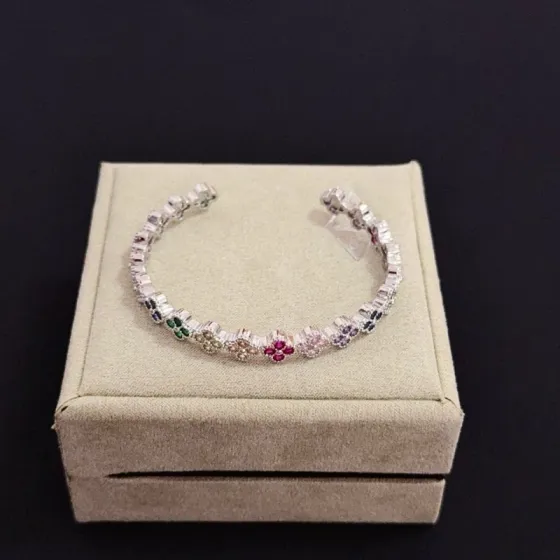 Van Cleef Arpels Alhambra bracelet Silver-toned metal with multicolor gemstones ruby red emerald green sapphire blue pink purple champagne 17cm