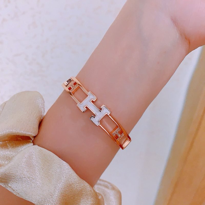Hermes Clic H bracelet rose gold gold tone metal with white enamel and clear diamond accents 17cm inner circumference
