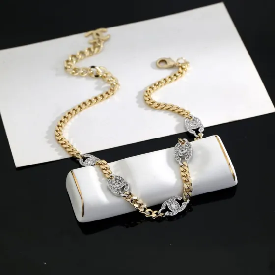 Chanel CC Crystal Cuban Chain Choker necklace gold-tone metal with silver-tone crystal-encrusted CC logos clear crystals 40cm with 5cm extender