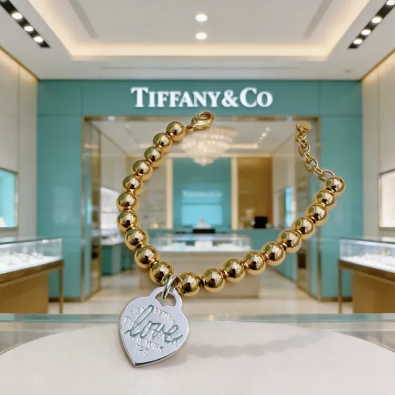 Tiffany Co Return to Tiffany Love Heart Tag Bead Bracelet bracelet gold-tone metal beads sterling silver heart tag with blue enamel script 7 inches