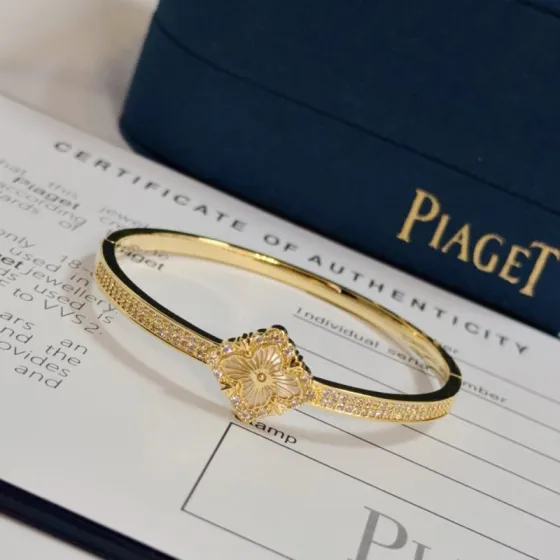 Piaget Rose bracelet Yellow gold with white diamond accents and mother-of-pearl flower detail 17cm