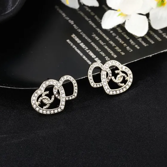 Chanel Interlocking CC Double Heart Crystal Stud Earrings earrings light gold tone metal with clear crystal accents 2cm width per earring