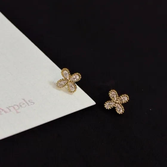 Van Cleef Arpels Timeless Butterfly earrings yellow gold with clear faceted gemstones 8mm stud diameter