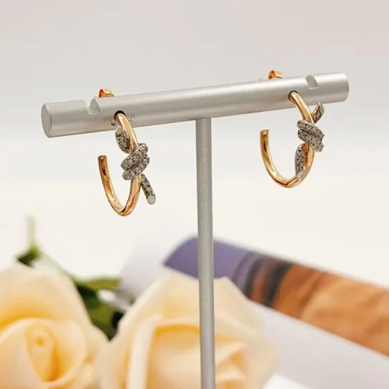 Tiffany Co Knot earrings 18k yellow gold with pave diamond accents 15mm hoop diameter