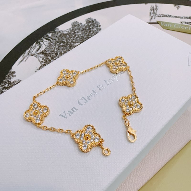 Van Cleef Arpels Alhambra bracelet yellow gold with clear diamond-like stones 18cm