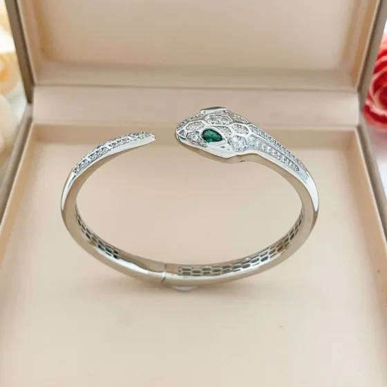 Bvlgari Serpenti bracelet silver-toned white gold with clear pave diamonds and green malachite accents 17cm inner circumference