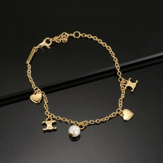 Celine Triomphe Heart Pearl Charm Bracelet bracelet gold-tone metal with white pearl 18cm with 3cm extender