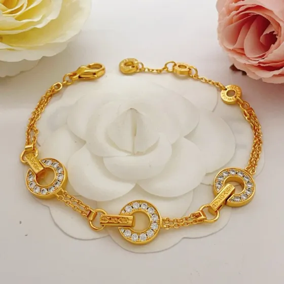 Bvlgari Bvlgari Bvlgari bracelet yellow gold with clear pave stones 18cm