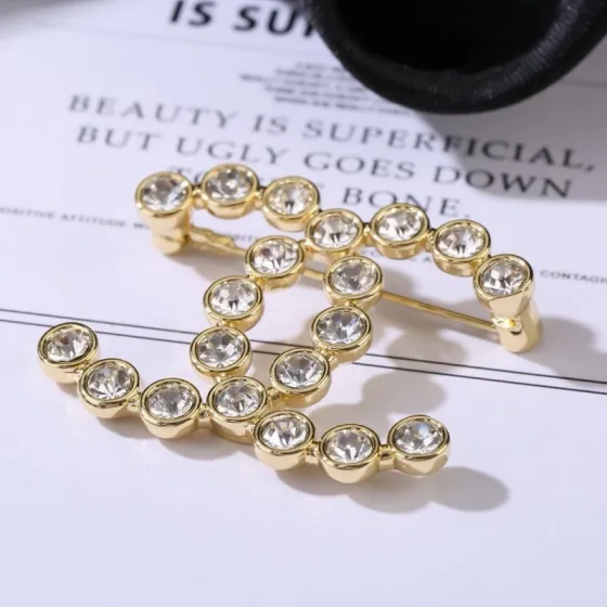 Chanel CC Crystal Brooch brooch gold-tone metal with clear faceted crystals 3 5cm width