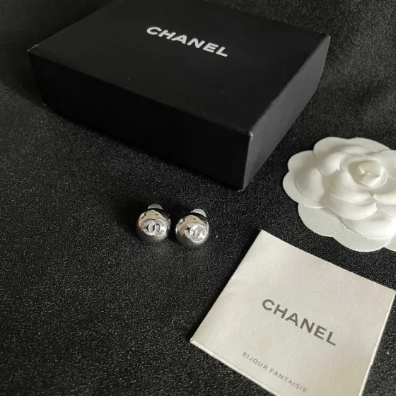 Chanel CC Logo Dome Stud Earrings earrings silver-tone metal with clear crystal accents 12mm diameter