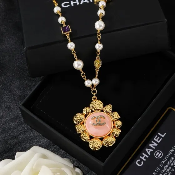 Chanel CC Logo Multicolor Gemstone Pearl Sun Pendant Necklace necklace Gold-tone metal with white pearls purple red green yellow clear pink and white gemstones 60cm