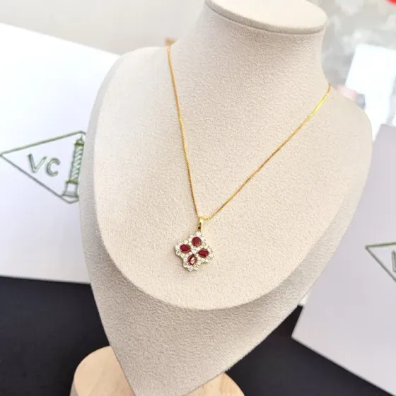 Van Cleef Arpels Alhambra necklace yellow gold metal ruby red gemstones clear diamond accents 42cm