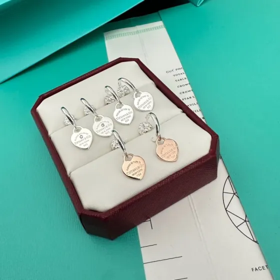 Tiffany Co Return to Tiffany Heart Tag Hoop Earrings earrings Sterling silver with clear diamond accent 18k rose gold 12mm hoop diameter