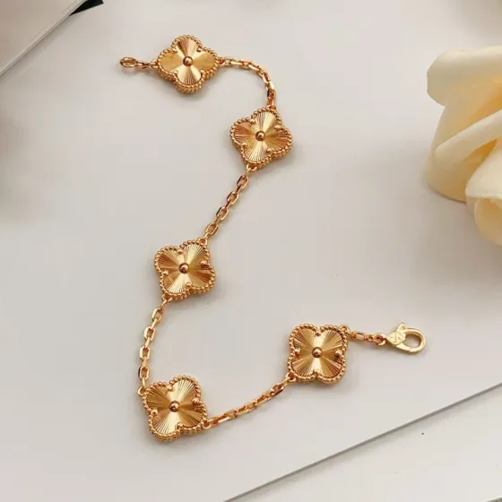 Van Cleef Arpels Vintage Alhambra bracelet 18k yellow gold with guilloche engraved clover motifs 18cm