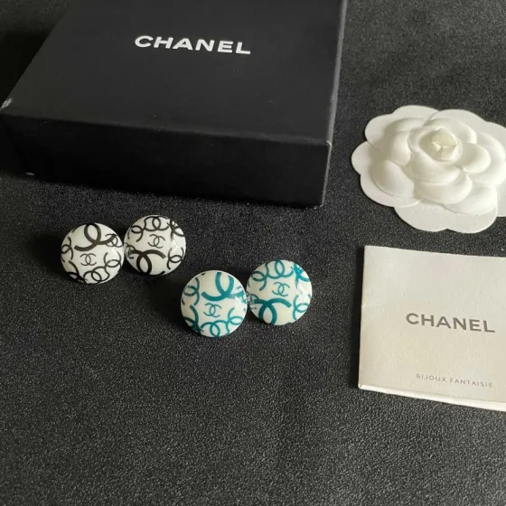 Chanel CC Logo Round Button Stud Earrings earrings White base with interlocking CC logo in black teal blue variants resin finish 2cm diameter