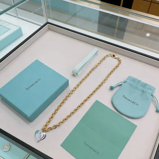 Tiffany Co Heart Tag necklace gold-tone metal chain silver-tone heart pendant 18 inches