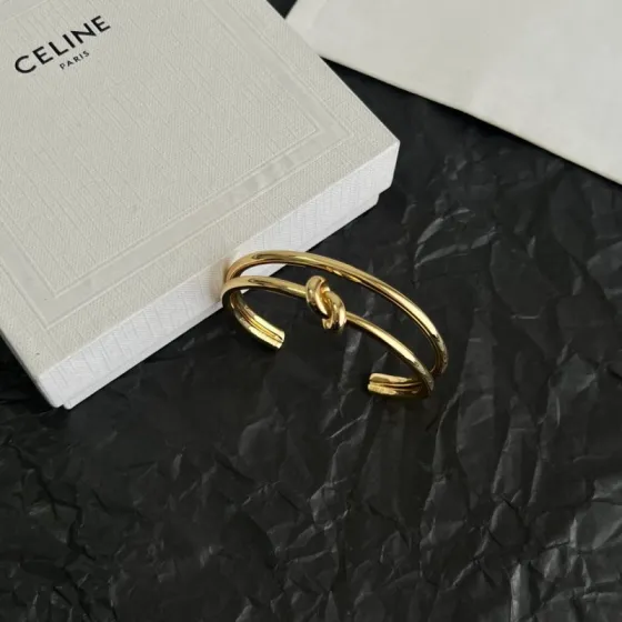 Celine Knot Double Band Cuff bracelet Gold-tone metal no gemstones One Size open cuff approx 6cm inner diameter