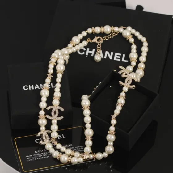 Chanel CC Logo Multi-Charm Pearl Long Necklace necklace Gold-tone metal cream white faux pearl clear crystal 80cm with 5cm extender chain