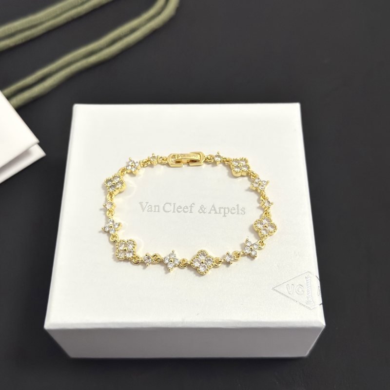 Van Cleef Arpels Alhambra bracelet gold-tone metal with clear diamond-like stones 17cm