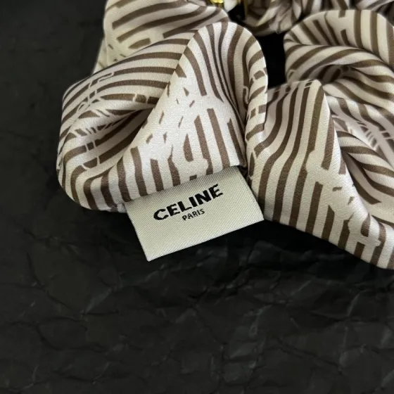 Celine Triomphe Striped Silk Scrunchie bracelet Ivory and brown striped silk with gold-tone Triomphe metal hardware One Size 10cm diameter